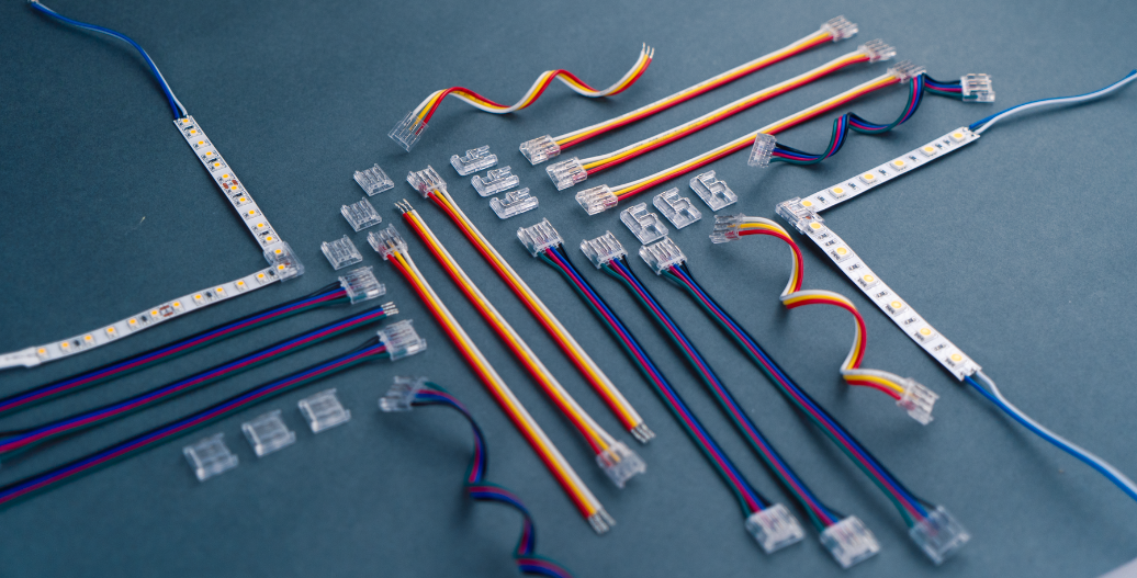 Angle connectors, bite connectors, splice connectors, and jumper connectors with wires and strip lights grouped together
