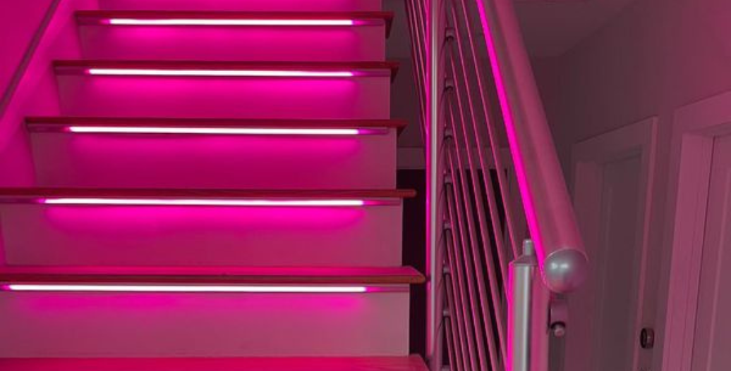 Pink strip lights on stairs