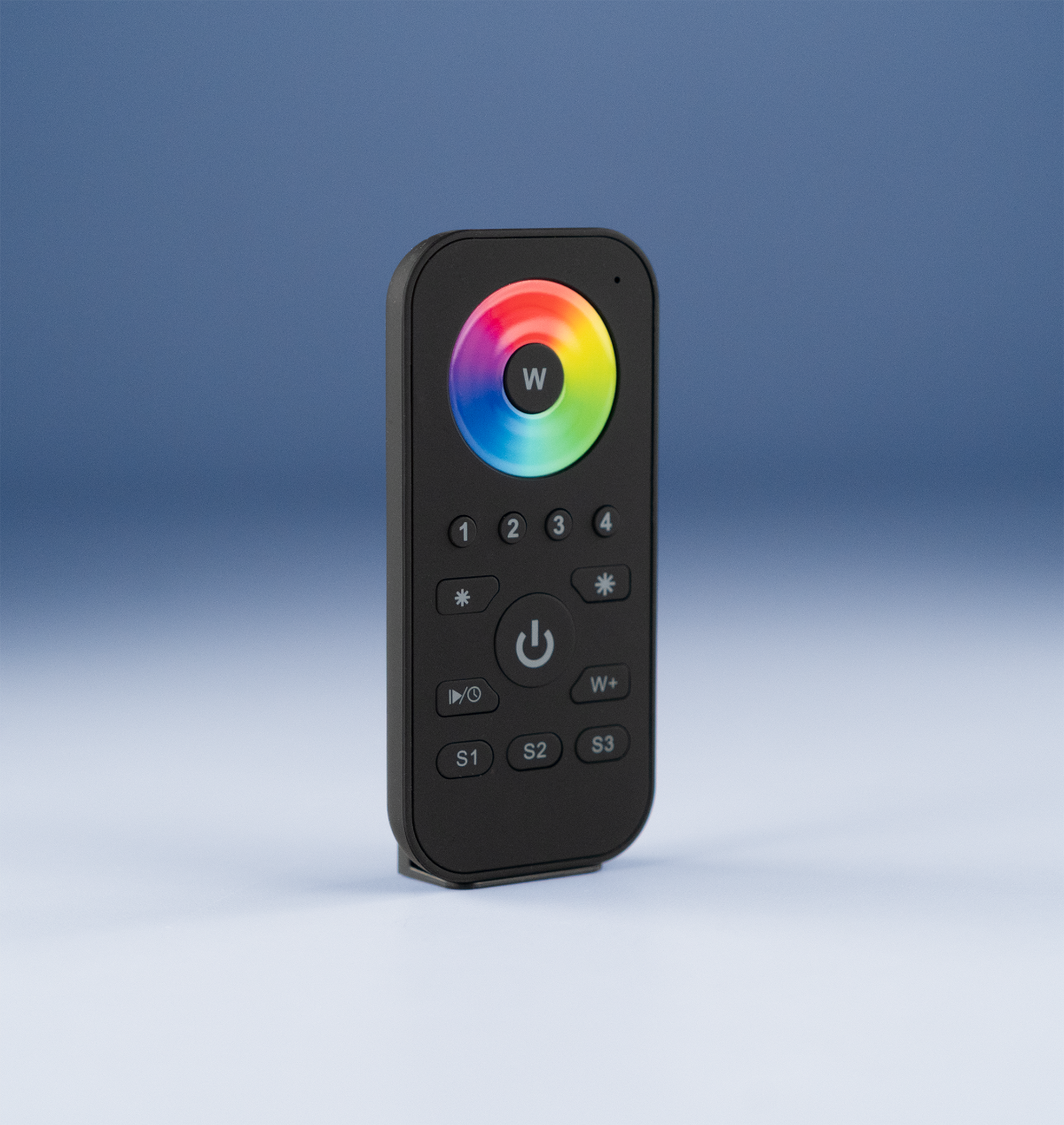 Black remote control with color wheel on a gradient blue and gray background