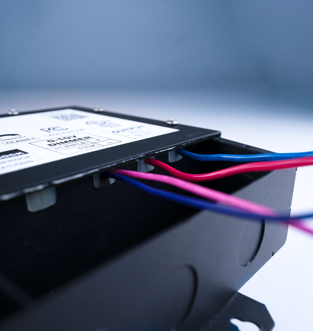 Close-up of electronic equipment with wires and a blurred background