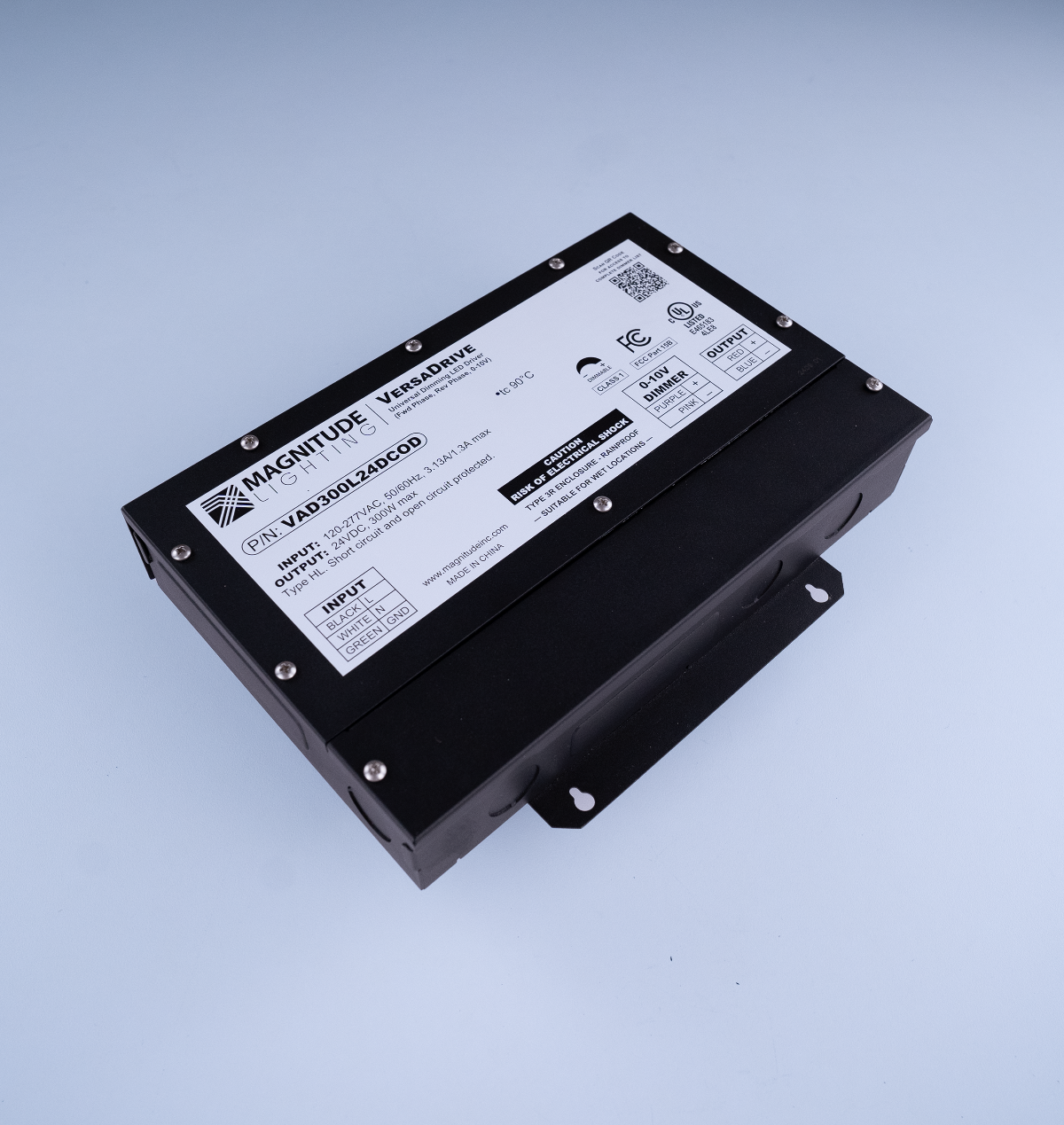 Black electronic device with label on a light blue background
