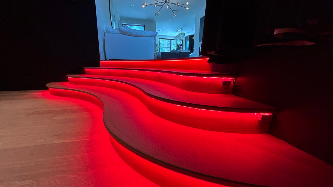 Stairs illuminated with strip lights on each stairs glowing red