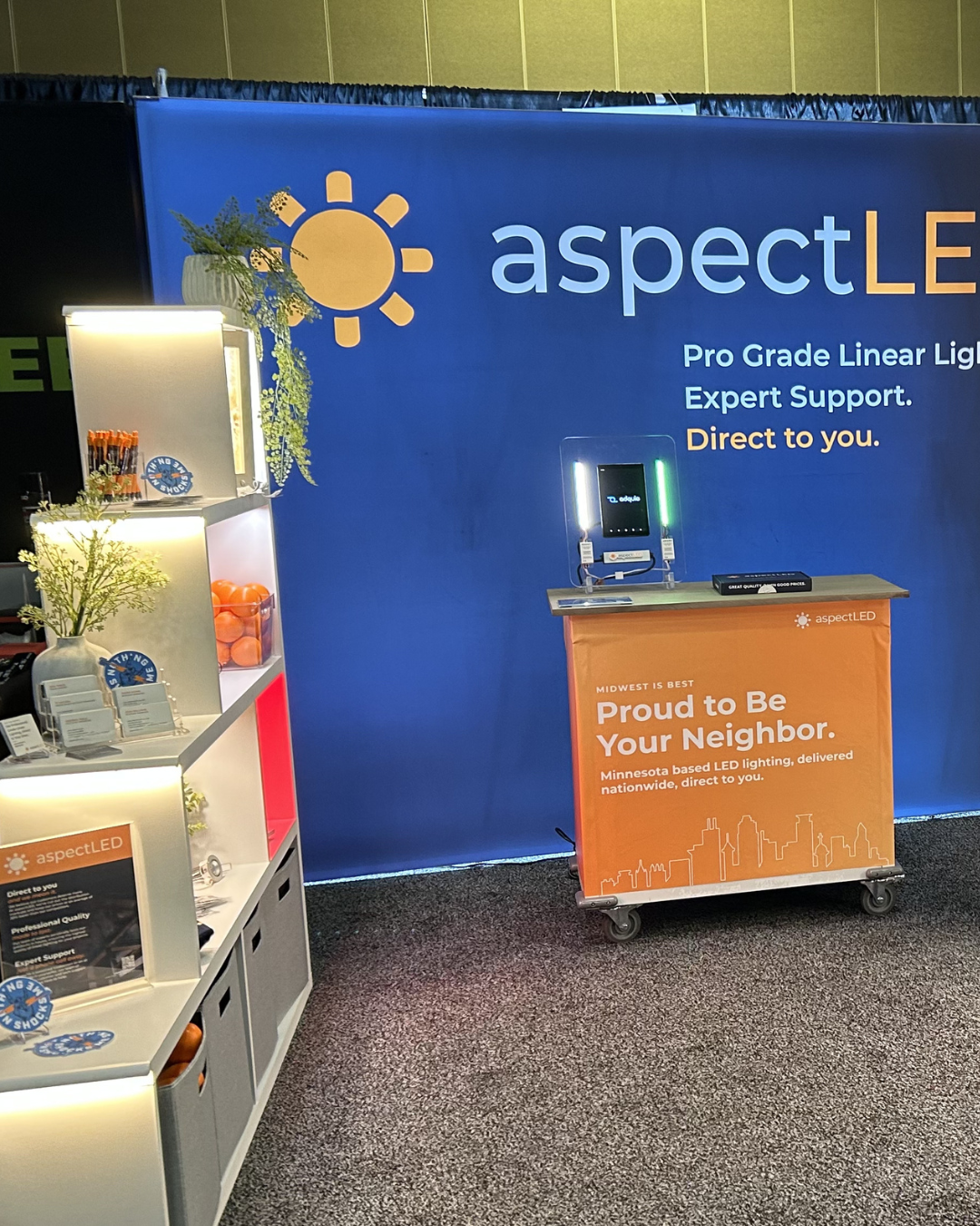 Promotional portable display with strip lights backlighting it