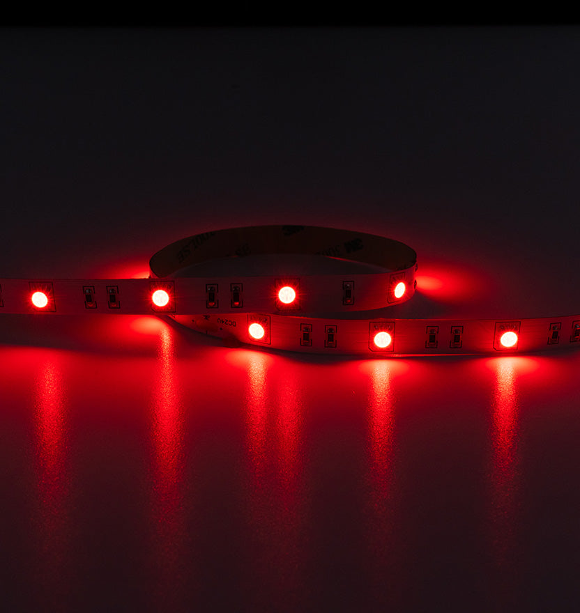 Red LED strip light on a dark background